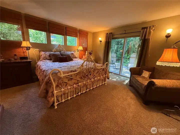 Primary suite leads to private deck for relaxing evenings.