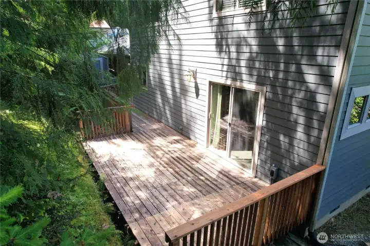 Primary suite with luxurious bathroom with two separate vanities, open shower, gorgeous tile work and private commode.