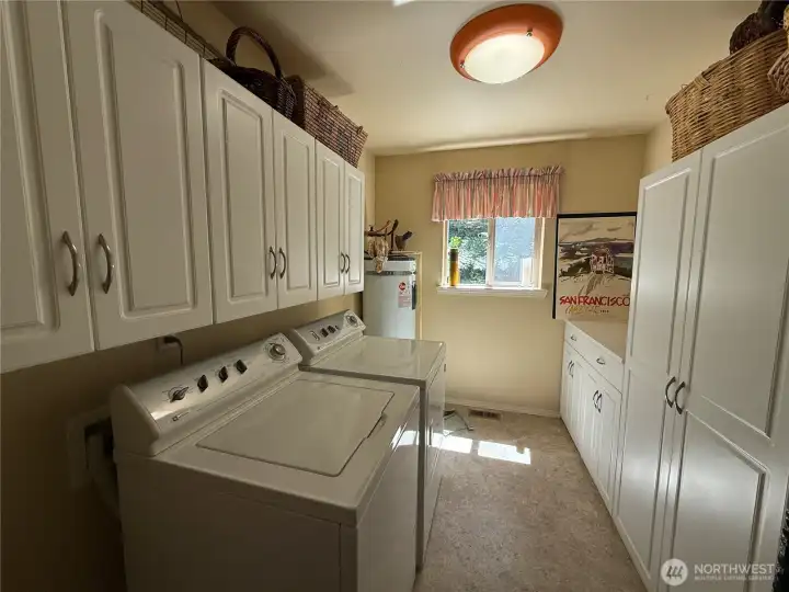 Spacious utility room with an abundance of storage space.