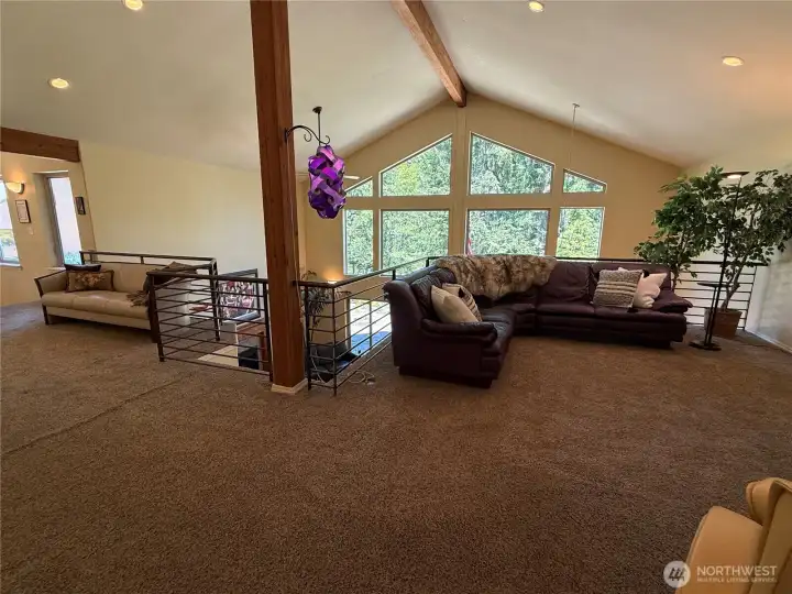 Another view of how spacious and versitile the open loft area is.