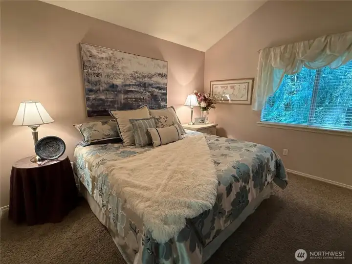 Another primary suite on upper level with own bathroom.