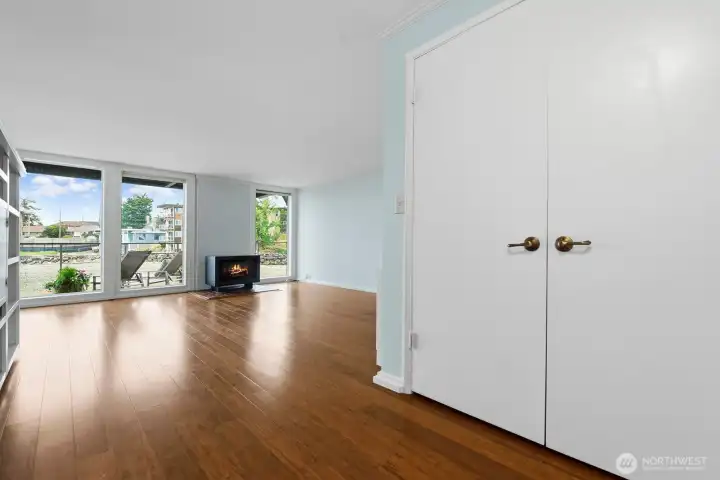 Open the door to see gleaming wood floors! Those double doors are a big closet.