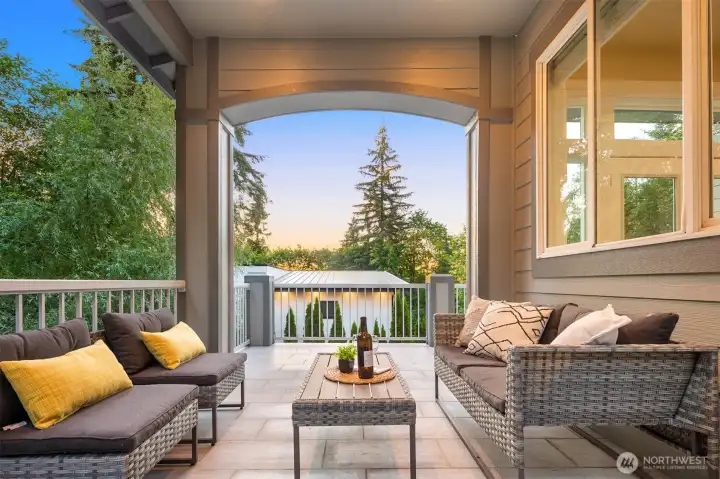 Covered outdoor deck off the kitchen and living spaces.