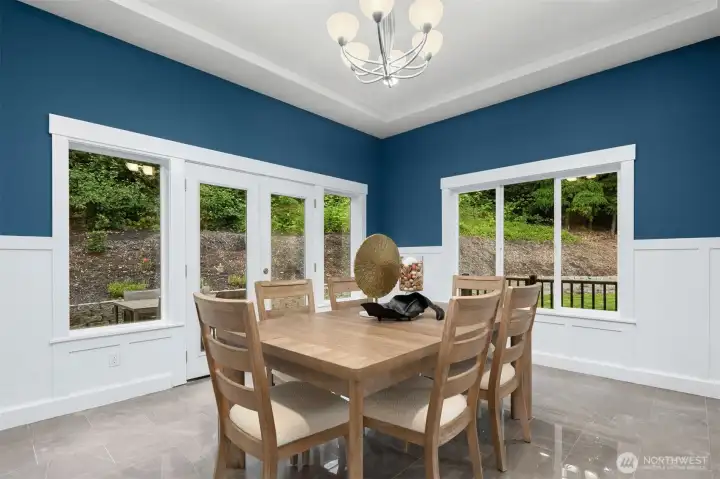 Large dining room off the kitchen with access to the back patio.