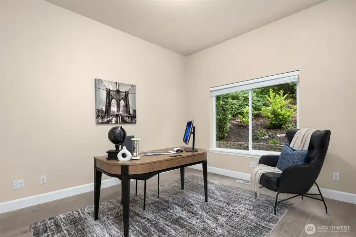 Main floor office or potential 4th bedroom with direct access to a 3/4 bath.