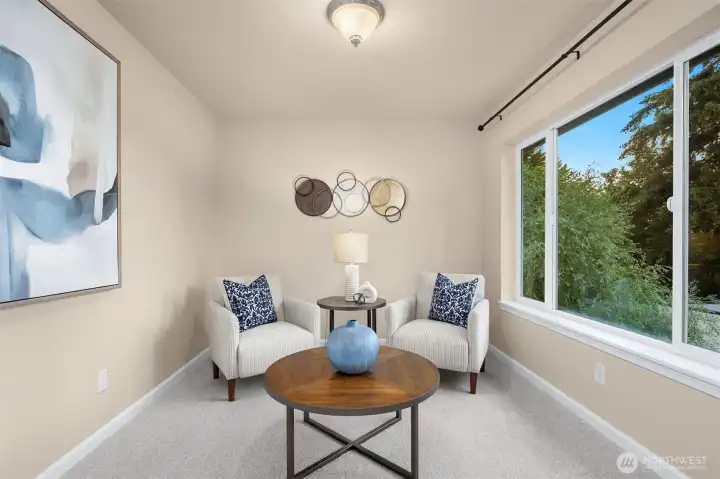 Primary suite with large sitting area, attached 5-piece bath, walk-in closet & private patio.