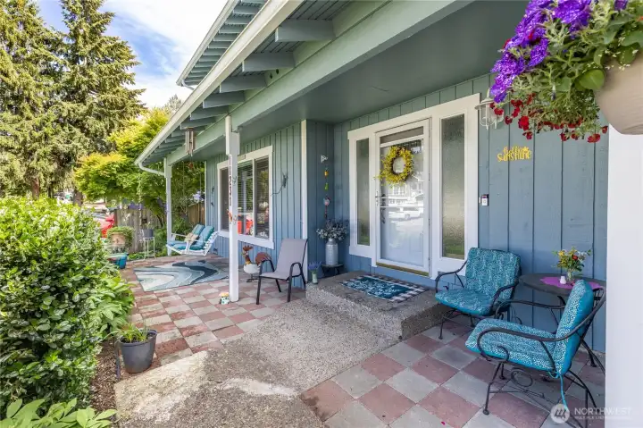 Charming and welcoming covered front patio Charming and welcoming covered front patio