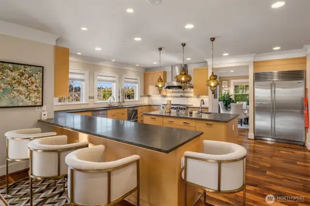 The island, chef’s kitchen with spacious counters and premium appliances, create a kitchen ready for your culinary masterpieces. It is the natural gathering place