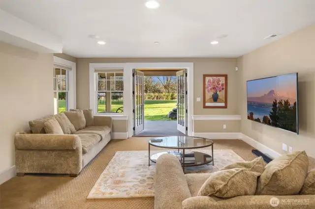 Lower level entertainment has great access to the yard. Ideal for all kinds of play