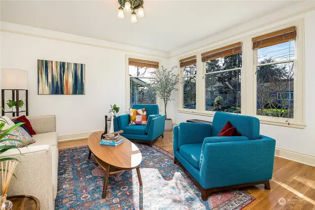 Light filled, large living room with newly refinished floors