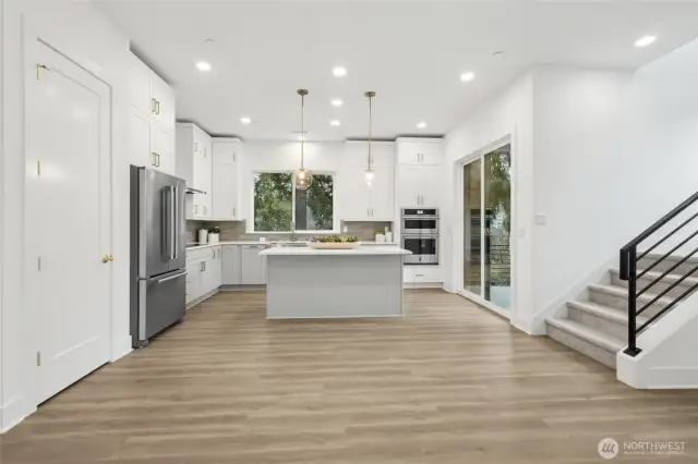 Main floor living. Features and finishes may vary. For marketing use only