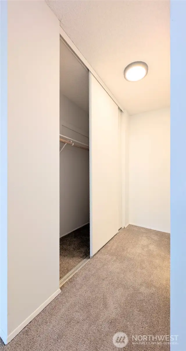 Turn Right into Primary Hall Closet and Ensuite Bathroom