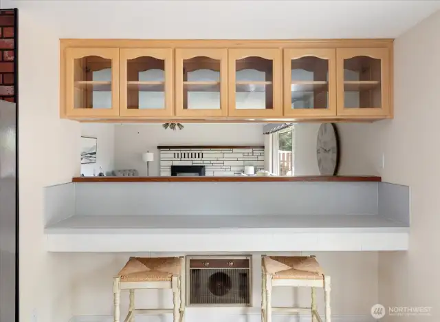 More guests? This bar can accommodate a few more! There are drawers there, too, for extra storage.