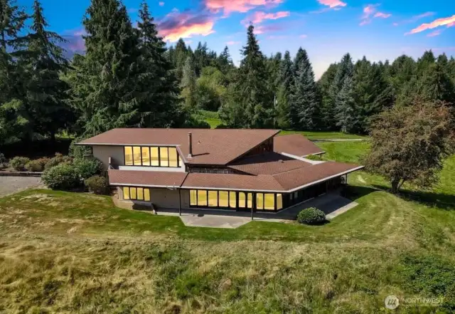 A true treasure. 1970's iconic custom built Frank Lloyd Wright-inspired home.