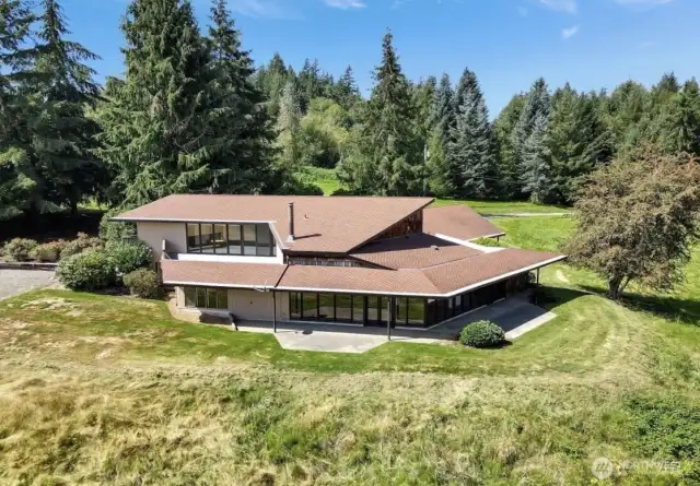 A true treasure. 1970's iconic custom built Frank Lloyd Wright-inspired home.