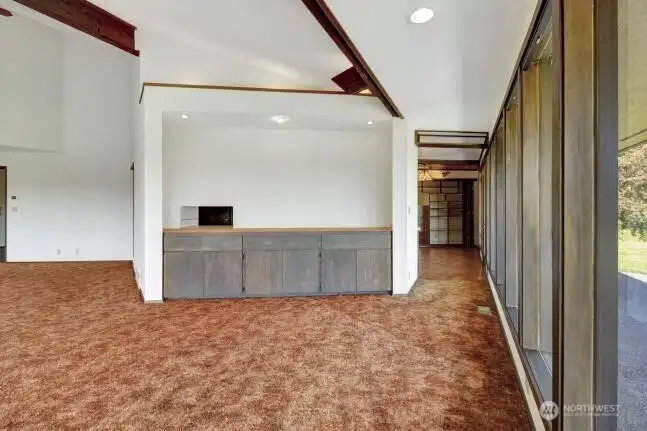 Original built-in buffet and kitchen pass-through. The pantry and kitchen eating area are also included in the frame.