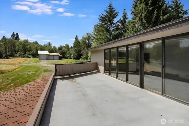 Functional rooftop deck conveniently located adjacent to the MIL living room.
