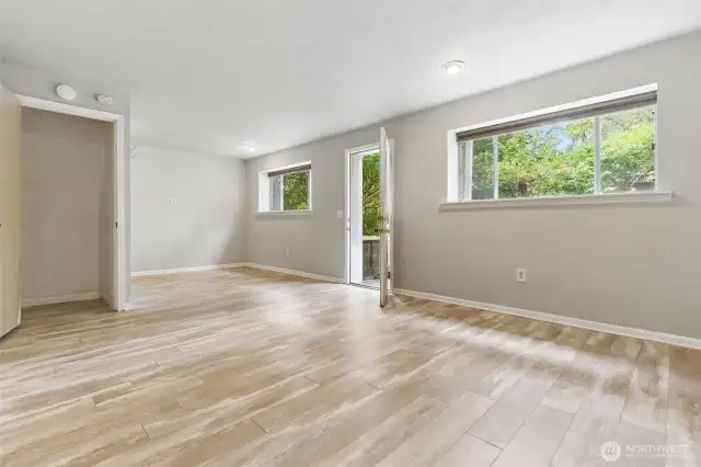 Basement is 3rd bedroom - stairwell door shown on left. Door leading to back patio also