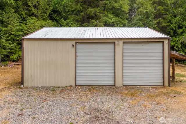 Detached 2 car garage with RV bays and shop space with loft!