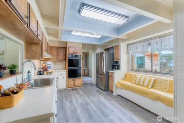 A must see ~ this oversized kitchen awaits! Built-in bench seating w/convenient storage below.