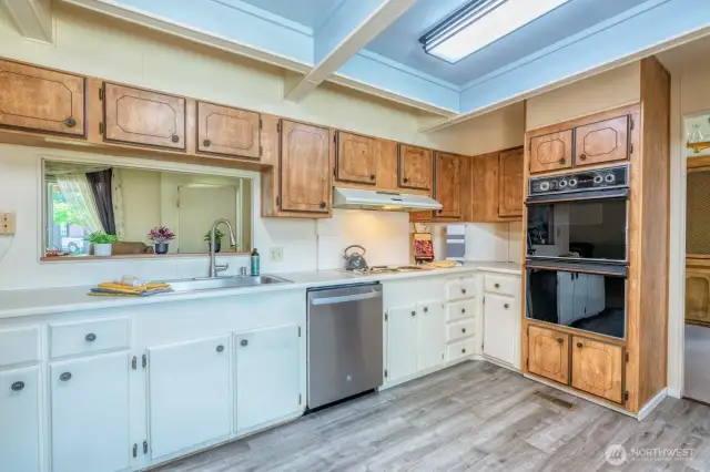 Hard to find a kitchen this spacious! New faucet and lighting.