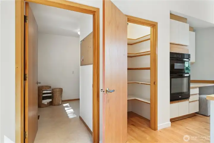 Pantry and laundry off kitchen.