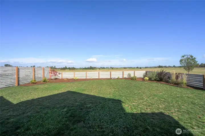 Large backyard and views of the golf course beyond