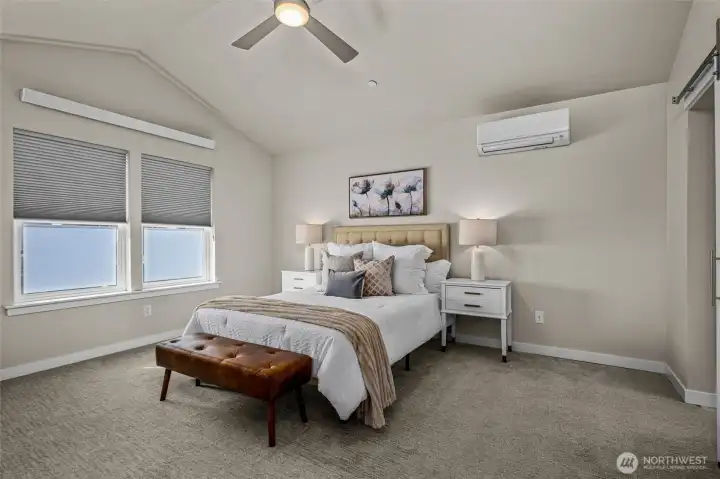 Primary Bedroom with vaulted ceilings