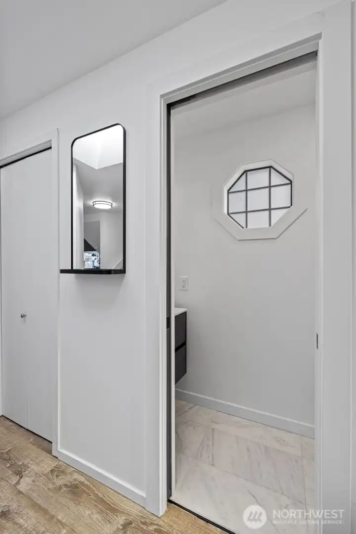 1/2 Bath on main finished with marble