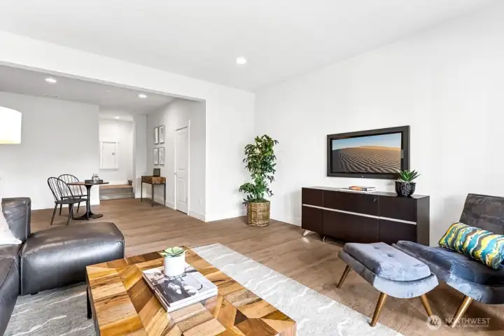 Walk out basement offers living room, wet bar, 5th bedroom, and 3/4 bath. Perfect for an owner's lounge space and/or a guest suite! Light and bright!