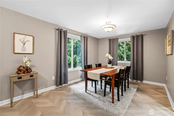 Dining room is off of the living room and kitchen which makes it seem less for entertaining.