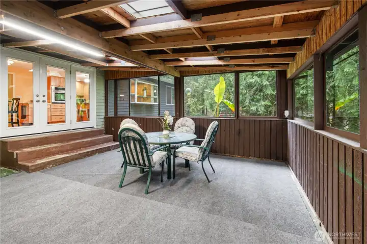 Fully enclosed sunporch to relax and take in the peaceful acreage surrounding you.