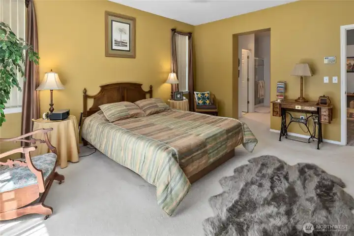 Primary bedroom looking back into private 5 piece bathroom ensuite.