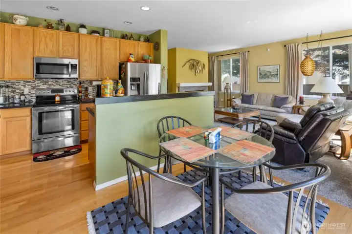 View from eating area back into kitchen and family room.