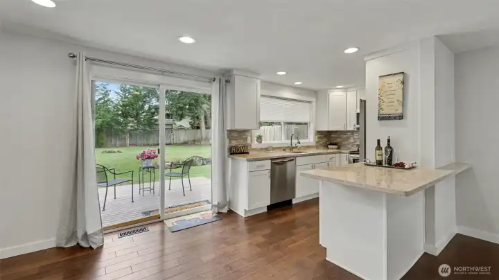 Newer hardwood floors & carpet.