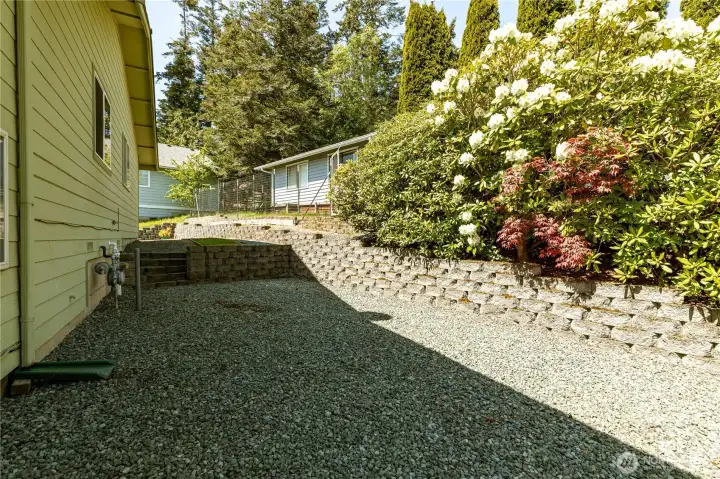 Side yard for extra parking or for your toys!