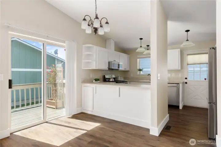 Sliding glass doors to Deck off the Dining area.  Room for everyone to eat and enjoy.
