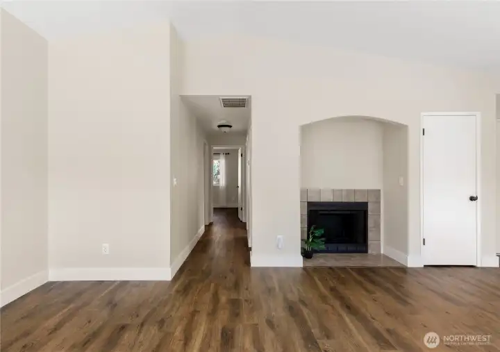 Down the hall to the 3 bedrooms and 2 baths.  Door on the right leads to the oversized 2 car Garage and laundry loft