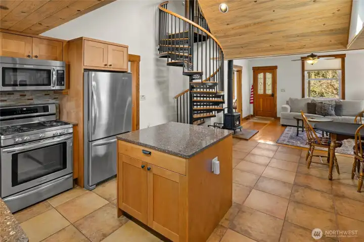 View of spiral staircase up to the 3rd bedroom. This is an oversized spiral staiecase, very easy to get up and down.