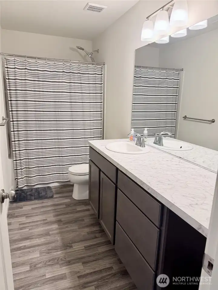 Upstairs full bathwith hard surfaced counters Upstairs full bathwith hard surfaced counters