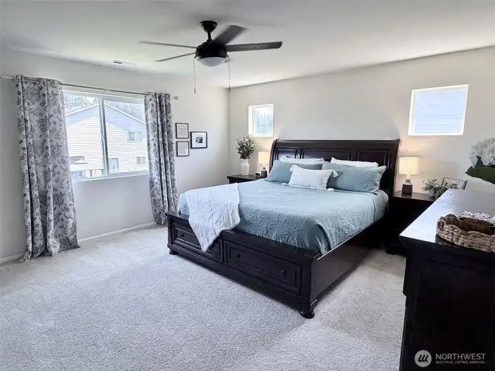 Spacious primary bedroom with en suite Spacious primary bedroom with en suite