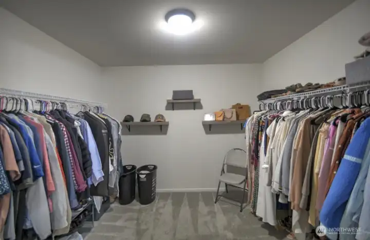 Primary bedroom walk in closet that is so big it could almost be an additional room! Primary bedroom walk in closet that is so big it could almost be an additional room!