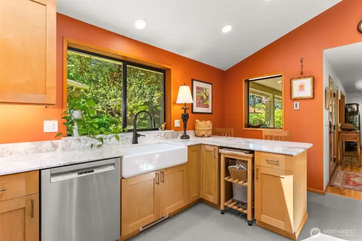 Oversized farm sink and doing dishes with a peaceful view of nature!