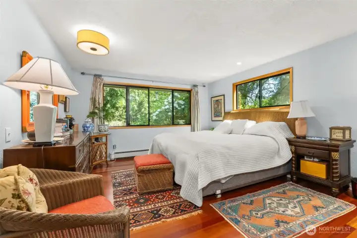 Primary Bedroom features cherry hardwood floors, territorial views, large walk-in closet and 5 piece en-suite.