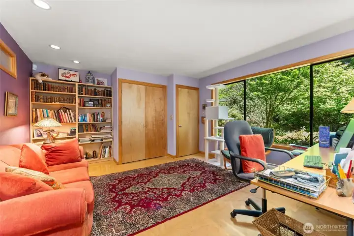 Bedroom 2 with two closets and private views.