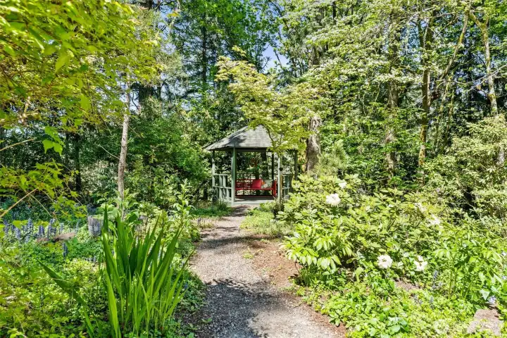 Packed with native and mature landscaping, a PNW oasis.