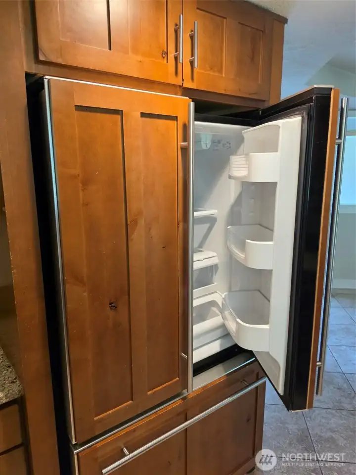 Dbl. door refrigerator with cabinet panel doors
