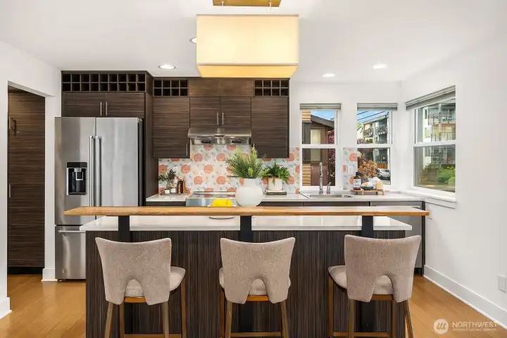 Or have your guests perch at the custom bar while you cook!