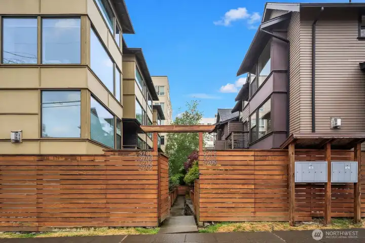 The Kasteel townhomes are truly a community, tucked behind a fence but close to everything.