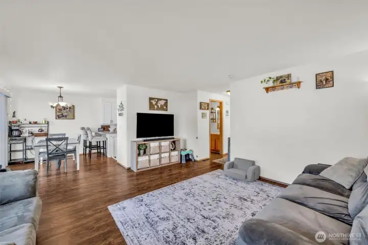 Unit #15332. Living room open to dining area